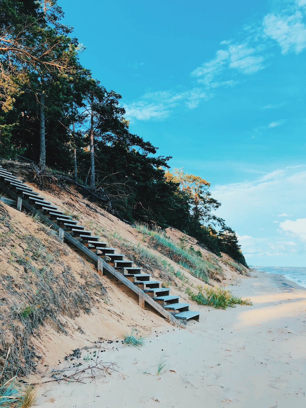 Sandy beach by Cumulus beach house by the lake Peipsi in Estonia