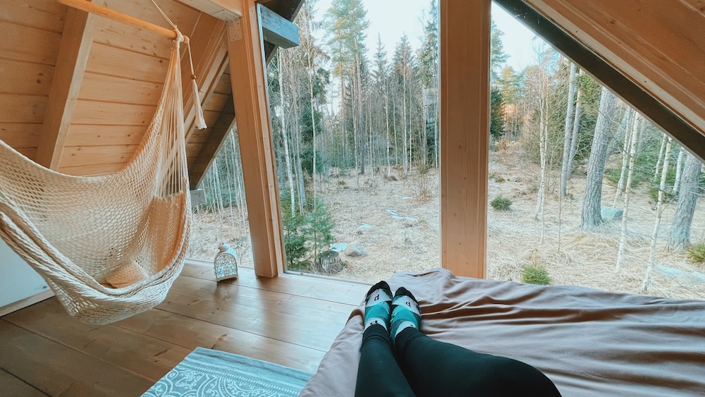 Tahkuna Forest House bedroom with a view to the forest in Estonia